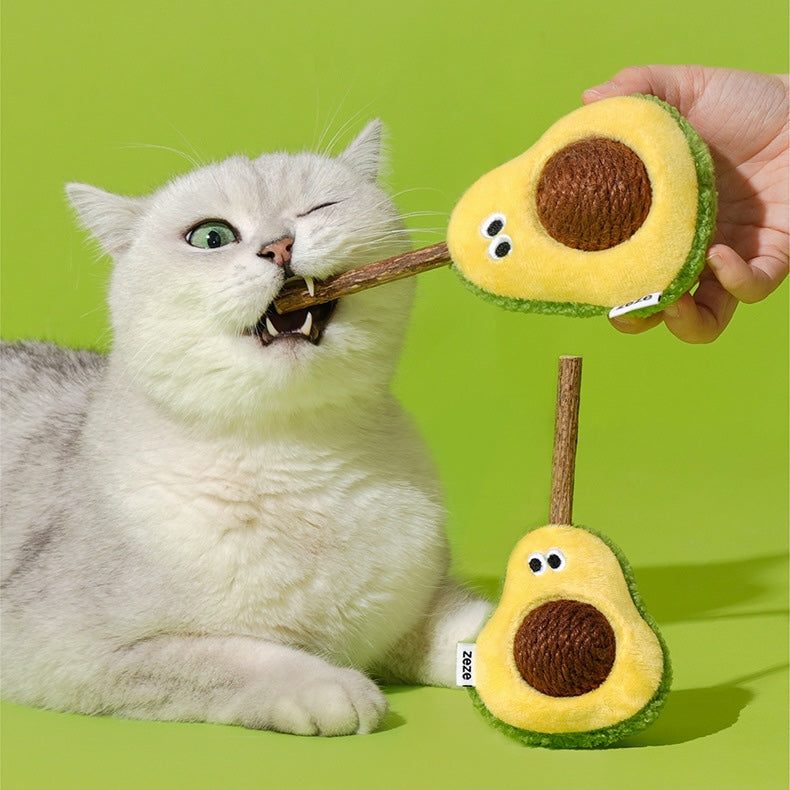 Cat interacting with avocado sisal rope ball toy for mental stimulation 