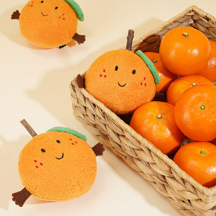 Plush orange-shaped cat toy stimulating cats’ senses and play instincts 