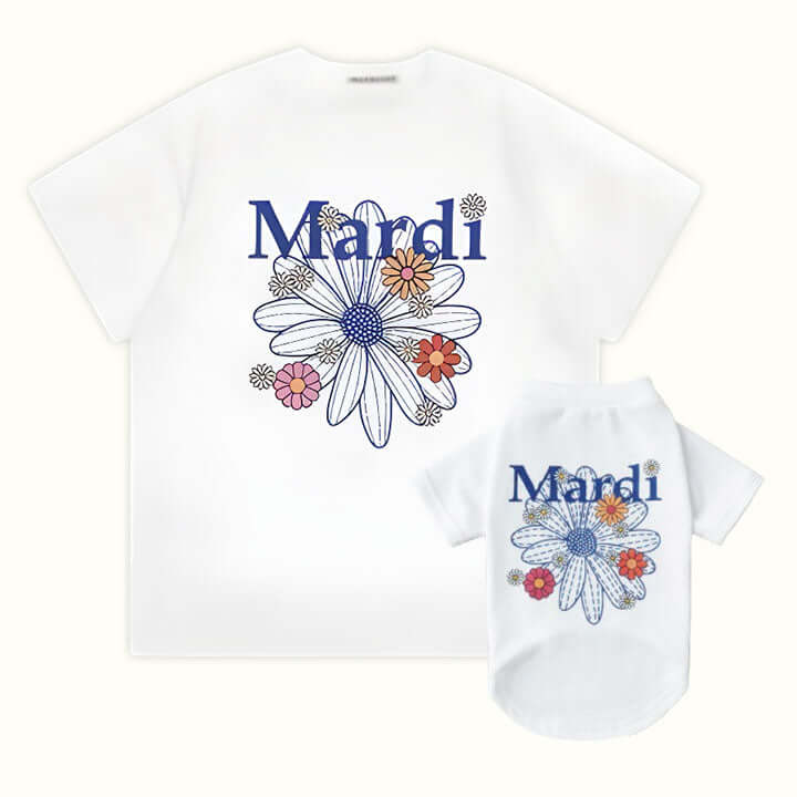 White pet and owner matching t-shirts with blue &