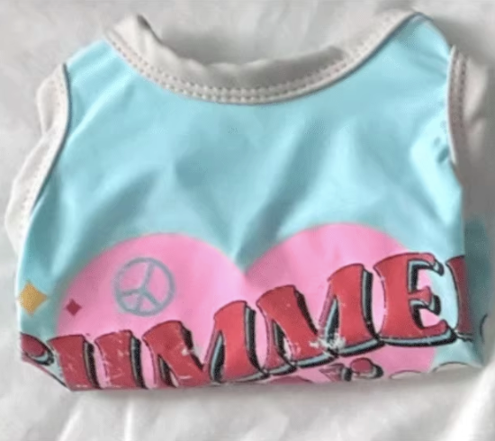 Dog's tee with 'SUMMER' text and peace symbol on a white background.