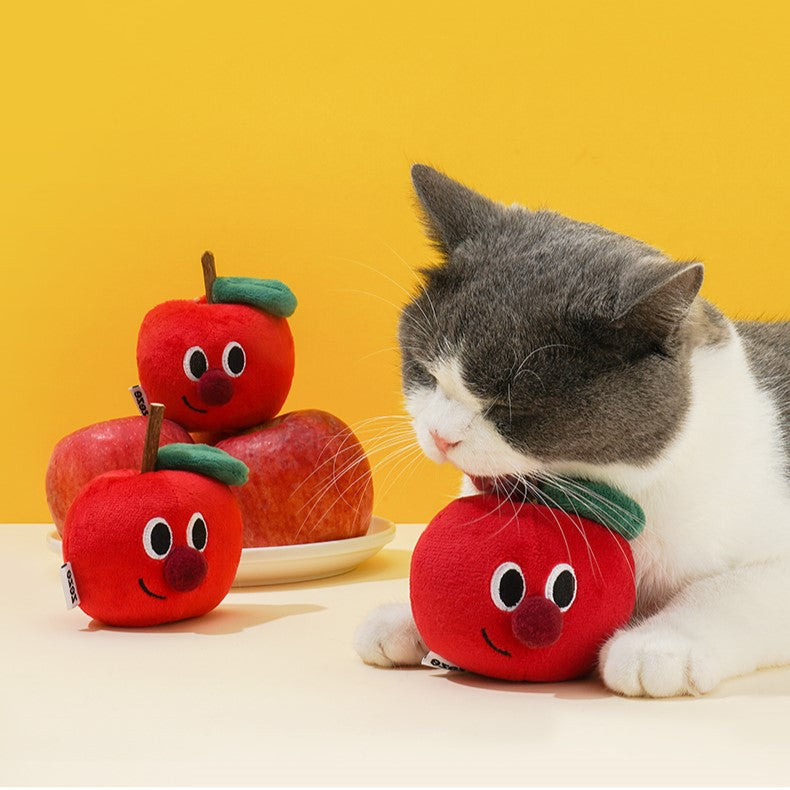 Cat batting apple wood teaser wand for fun and exercise 