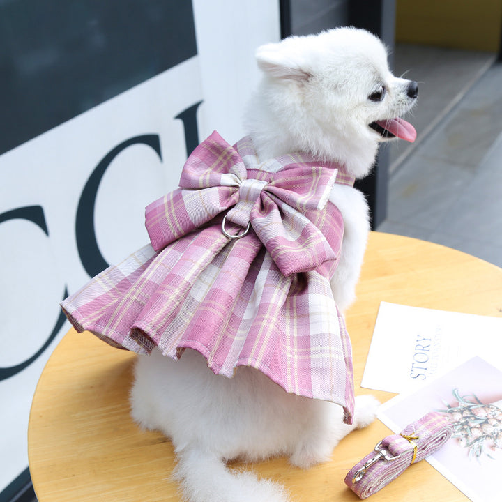 dog wearing pink plaid bow design dress harness