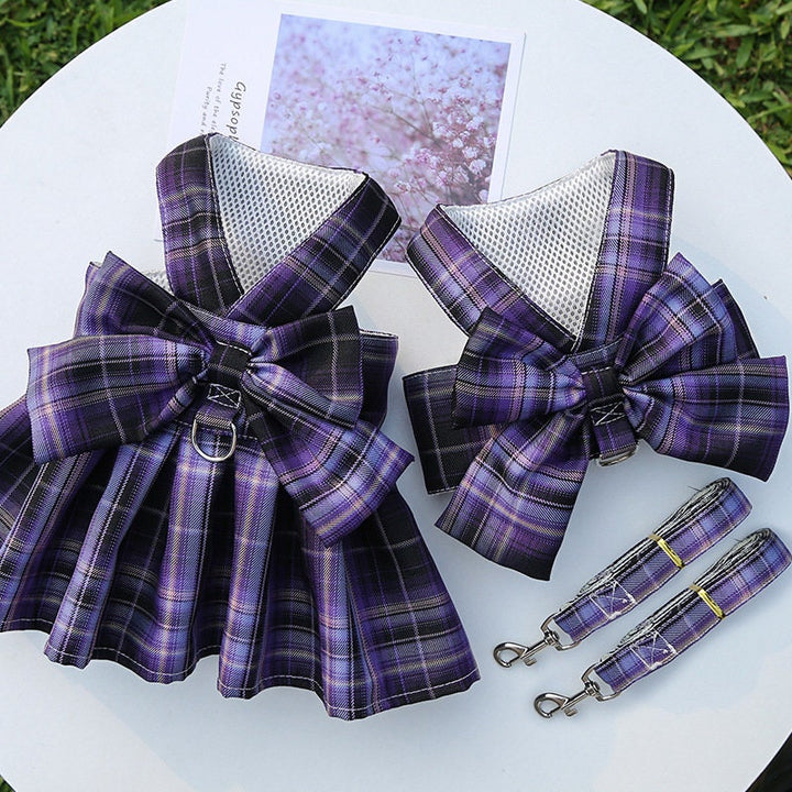 Purple dress harness and vest harness set on table